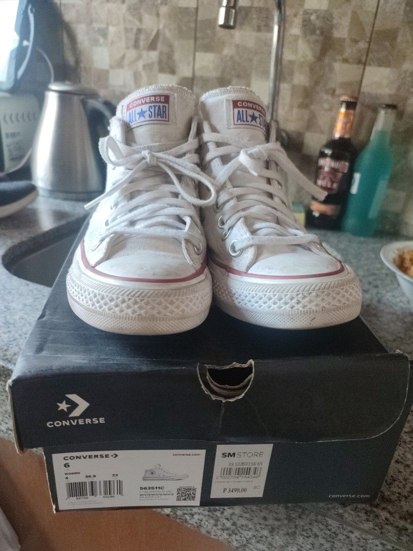 Converse All Star High Top White (Category: Sneakers) located in Quezon City. Submitted by PaidTY (Listing ID 1427687438, Image 1). Description: Needs cleaning lang pero hindi nagamit masyado. Bought for Php 3,490 with box pa. rfs: outgrown by my daughter Size: US 6 , 23 cm Classic Converse All Star high-top sneakers in white. Features the iconic Converse All Star logo on the side and tongue. Includes the original box. The soles show some wear. T