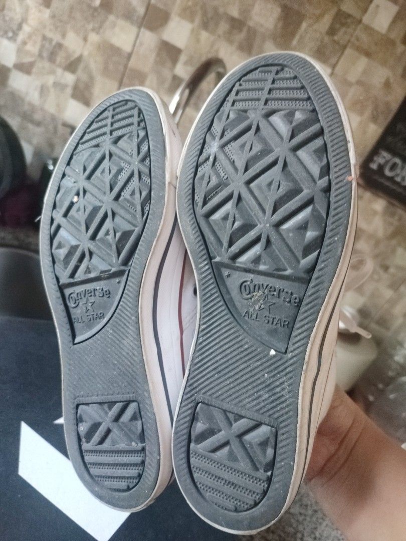 Converse All Star High Top White (Category: Sneakers) located in Quezon City. Submitted by PaidTY (Listing ID 1427687438, Image 3). Description: Needs cleaning lang pero hindi nagamit masyado. Bought for Php 3,490 with box pa. rfs: outgrown by my daughter Size: US 6 , 23 cm Classic Converse All Star high-top sneakers in white. Features the iconic Converse All Star logo on the side and tongue. Includes the original box. The soles show some wear. T