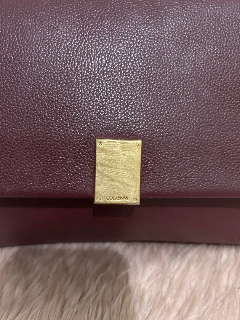 Couronne Sling bag (Category: Luxury Bags & Wallets) located in Quezon City. Submitted by heycathiee (Listing ID 1427659744, Image 3). Description: Couronne sling bag ~ rank 8/10 ~ maroon / burgundy color ~ comes w adjustable sling ~ no rubs; normal signs of used only ~ metal plate w hairlines ~ with inner pocket In cm : L 25 | H 18 | W 7.5 .