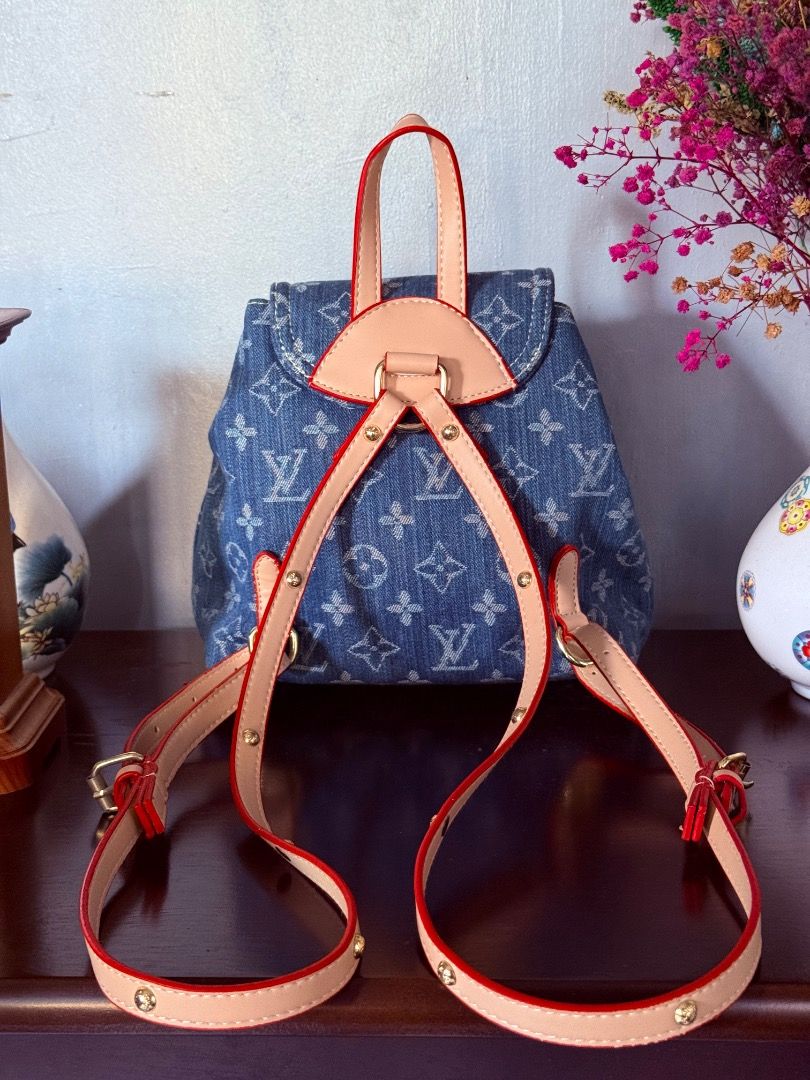Cute Mini Denim Bag (Category: Luxury Bags & Wallets) located in Cotabato. Submitted by goldenhiveph0826 (Listing ID 1427712757, Image 2). Description: ❤️○ Stylish denim backpack with LV monogram pattern ❤️○ Gold hardware, pink leather handles/straps, red trim ❤️○ Spacious interior, like-new condition with minimal signs of use ❤️• Features: Two front pockets, flap closure, adjustable straps. ✅• Perfect for: School, work, or weekend trips ✅• Dimen
