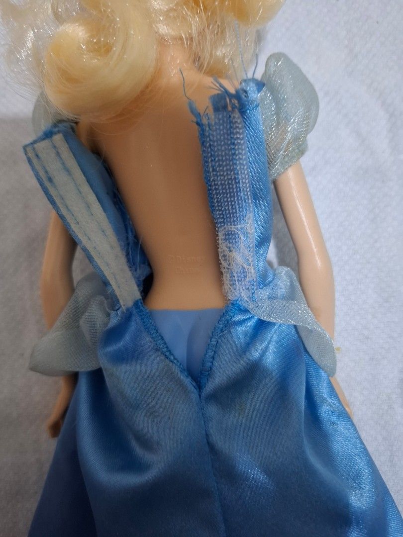 Disney Cinderella Doll (Category: Figurines & Statues) located in Tarlac. Submitted by dhiyanatividad (Listing ID 1427753036, Image 2). Description: Comes with courtyside dress. Flaw: discoloration on leg.