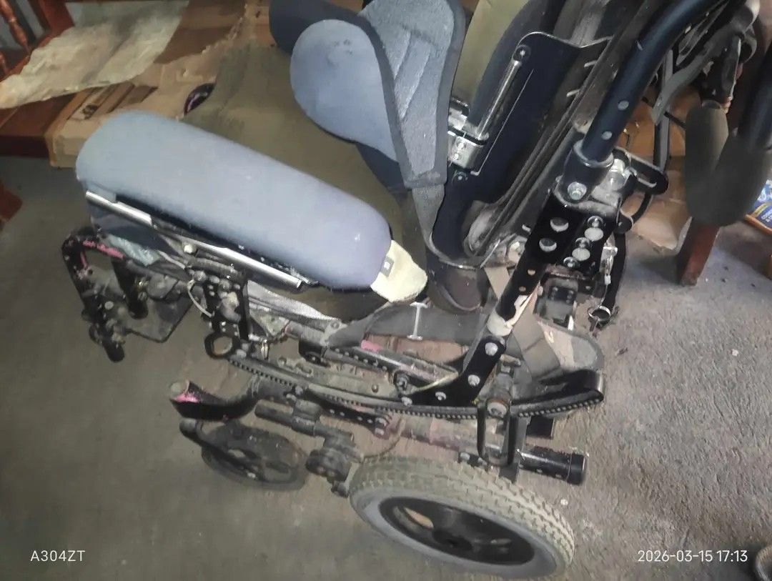 Heavy duty Wheelchair (Category: Wheelchairs) located in Bulacan. Submitted by tinybutmightyyroh (Listing ID 1427657105, Image 3). Description: heavy duty wheelchair with armrests and footrests. Features a padded seat and backrest. The wheelchair has a dark-colored frame and wheels. .