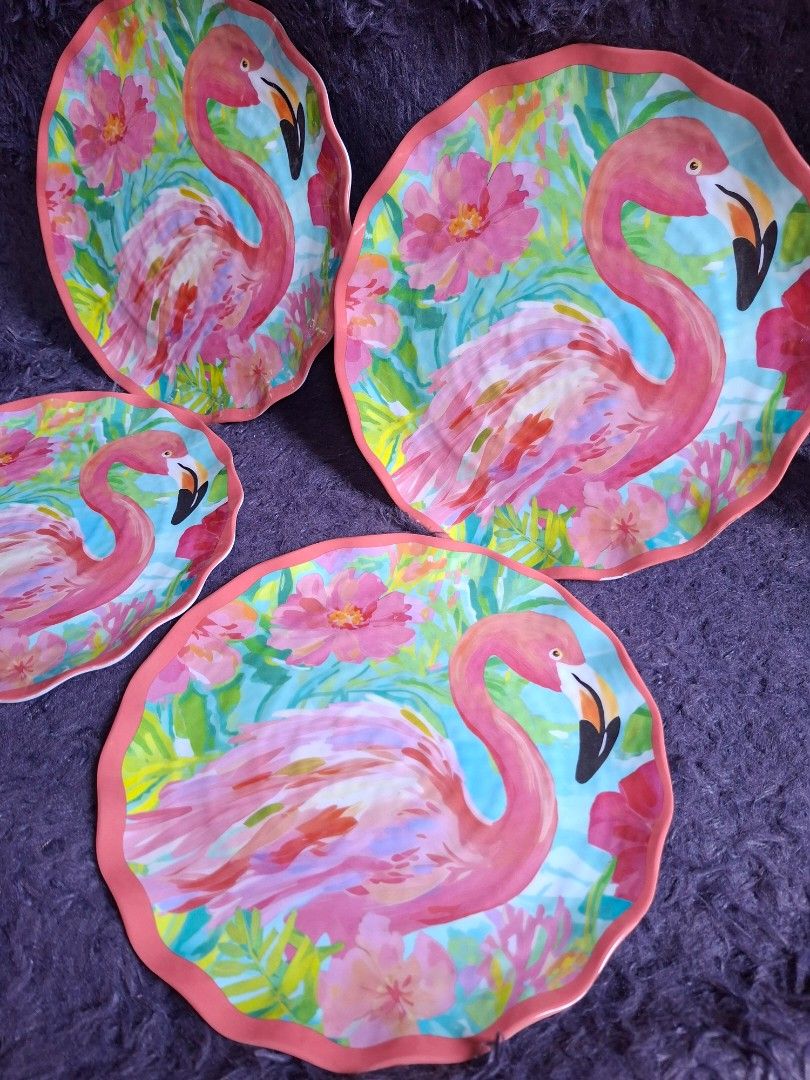 Flamingo Design Plates Set of 4 (Category: Dinnerware & Cutlery) located in Quezon City. Submitted by charsonetrends (Listing ID 1427665939, Image 3). Description: Set of four decorative plates featuring a vibrant flamingo design. Each plate has a scalloped edge and a colorful flamingo and floral pattern. The plates are suitable for dishwasher and safe-top rack use. .
