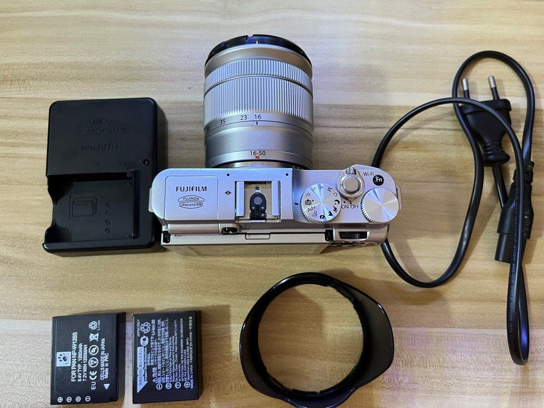 Fujifilm XA2 (Category: Cameras) located in Pateros City. Submitted by justprettythings07 (Listing ID 1187680970, Image 1). Description: Fixed Price. Inclusions: - Camera - Kitlens + Lens hood - Charger - Extra battery - Camera bag Issues: - minor scratches on the body of the camera - vignette on LCD screen, but it doesn't affect the output Lady owned. Still with box. RFS: decluterring.