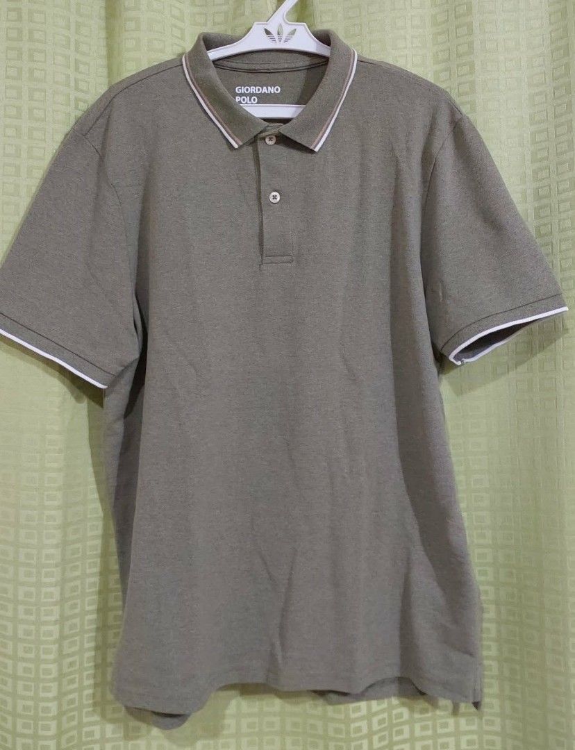 Giordano Polo Shirt - Size M (Category: Tshirts & Polo Shirts ) located in Rizal. Submitted by zhellieme (Listing ID 1427730837, Image 1). Description: Giordano polo shirt in olive green. Features a white-trimmed collar and sleeves. It has a tapered fit. Size M (170/96A)..