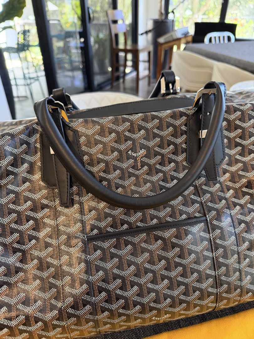 Goyard Bowling 55 Bag - Black (Category: Luxury Bags & Wallets) located in Bacoor. Submitted by umsph (Listing ID 1427656349, Image 3). Description: Goyard Bowling 55 Bag - Black Condition: 9.8/10 Preowned, Used Once Inclusions: Comes with dust bag and locket Jewelry: Palladium Front outside pocket, 4 leather corners Height of the handle(s) : 20 cm Material Goyardine Canvas & Cervon Calfskin Yellow Water-repellent Cotton Lining Dimensions Length: