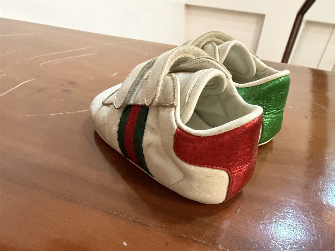 Gucci Baby Ace Sneakers (Category: Babies & Kids Fashion) located in Quezon City. Submitted by midzammar (Listing ID 1427761014, Image 2). Description: GUCCI BABY ACE LEATHER SNEAKERS ₱ 8,000 — gently used but needs cleaning — comes with its original box — recommended for newborns (0-3m).