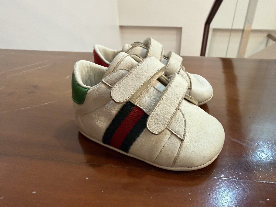 Gucci Baby Ace Sneakers (Category: Babies & Kids Fashion) located in Quezon City. Submitted by midzammar (Listing ID 1427761014, Image 1). Description: GUCCI BABY ACE LEATHER SNEAKERS ₱ 8,000 — gently used but needs cleaning — comes with its original box — recommended for newborns (0-3m).