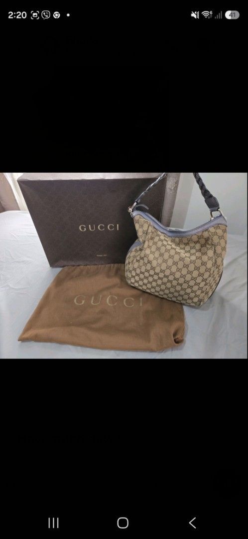 Gucci GG Canvas Hobo Bag (Category: Luxury Bags & Wallets) located in Quezon City. Submitted by frankstuff (Listing ID 1427676033, Image 1). Description: well used. no flaws. complete with box and dustbag.