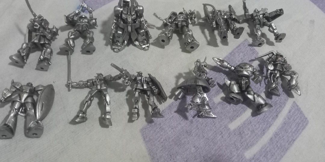 GUNDAM Miniature Figure, ALL ORIGINAL (Category: Gundam & Model Kits) located in Manila. Submitted by fmpc7878 (Listing ID 1427723669, Image 3). Description: still in good condition, 12 figures, NO STAND, AS IS, ORIGINAL, MINIS ONLY ALL FOR 400, with 1 free as well.