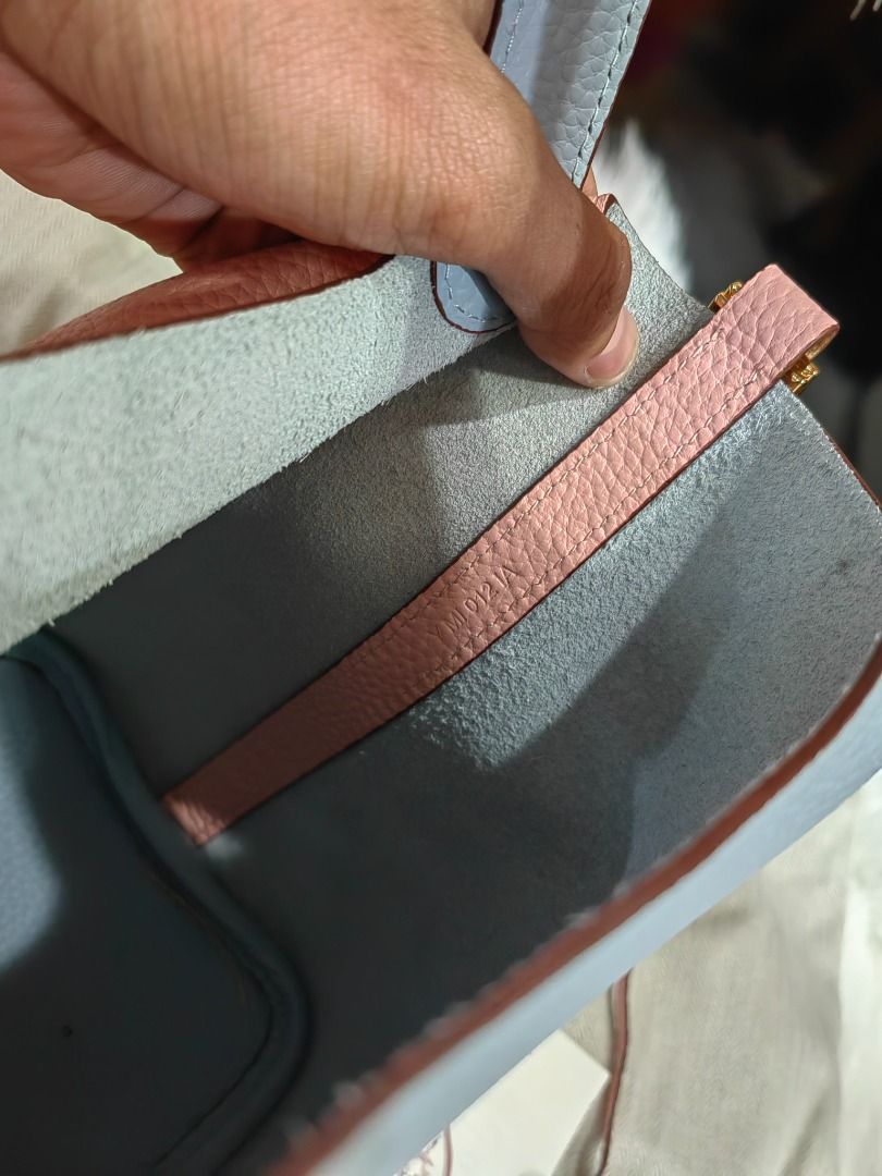 Hermes Picotin 18 Two-Tone Handbag (Category: Luxury Bags & Wallets) located in Cebu City. Submitted by erlacoleccion (Listing ID 1427643080, Image 3). Description: Hermes Picotin 18 handbag. Features a two-tone design with pink and blue leather. Includes a lock and key. Comes with a dust bag and Hermes card. A stylish and versatile bag for everyday use..
