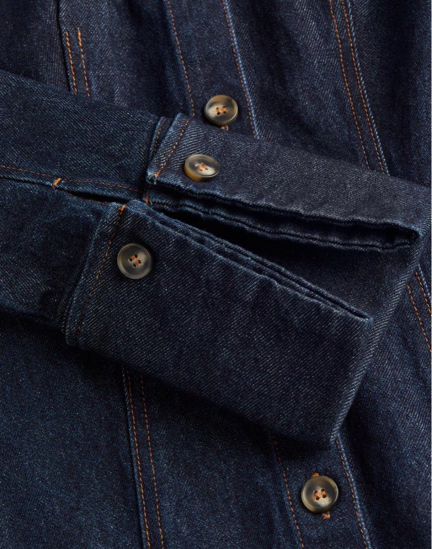H&M Fitted Denim Shirt (Category: Coats, Jackets and Outerwear) located in Paranaque City. Submitted by capeg (Listing ID 1427735297, Image 3). Description: - Dark wash denim shirt jacket - Classic collar - Button-down closure - Long sleeves with flared cuffs - Tailored fit - Flattering silhouette - New with tag.