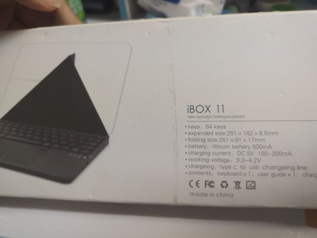 iBOX 11 New Concept Folding Keyboard (Category: Computer Keyboard) located in Manila. Submitted by reichellen93323 (Listing ID 1427716897, Image 2). Description: IBOX 11 new concept folding keyboard. It has 64 keys, a built-in touchpad, and is rechargeable. The expanded size is 251 x 182 x 8.5mm, and the folding size is 251 x 91 x 17mm. It comes with a type C to USB charging cable. Made in China..