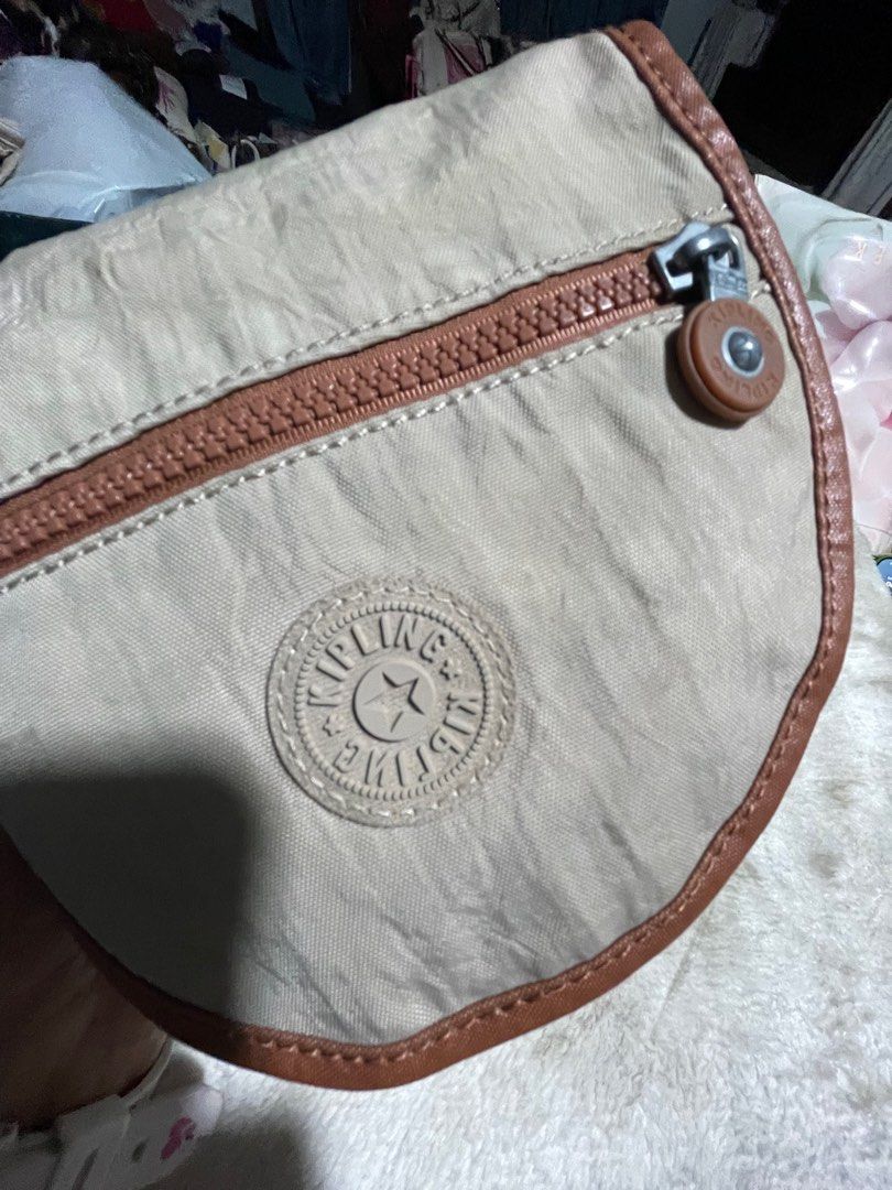 Kipling Circular Beige/brown cross-body bag (Category: Ear Care) located in Mandaue City. Submitted by chuchi152615 (Listing ID 1427735410, Image 2). Description: .