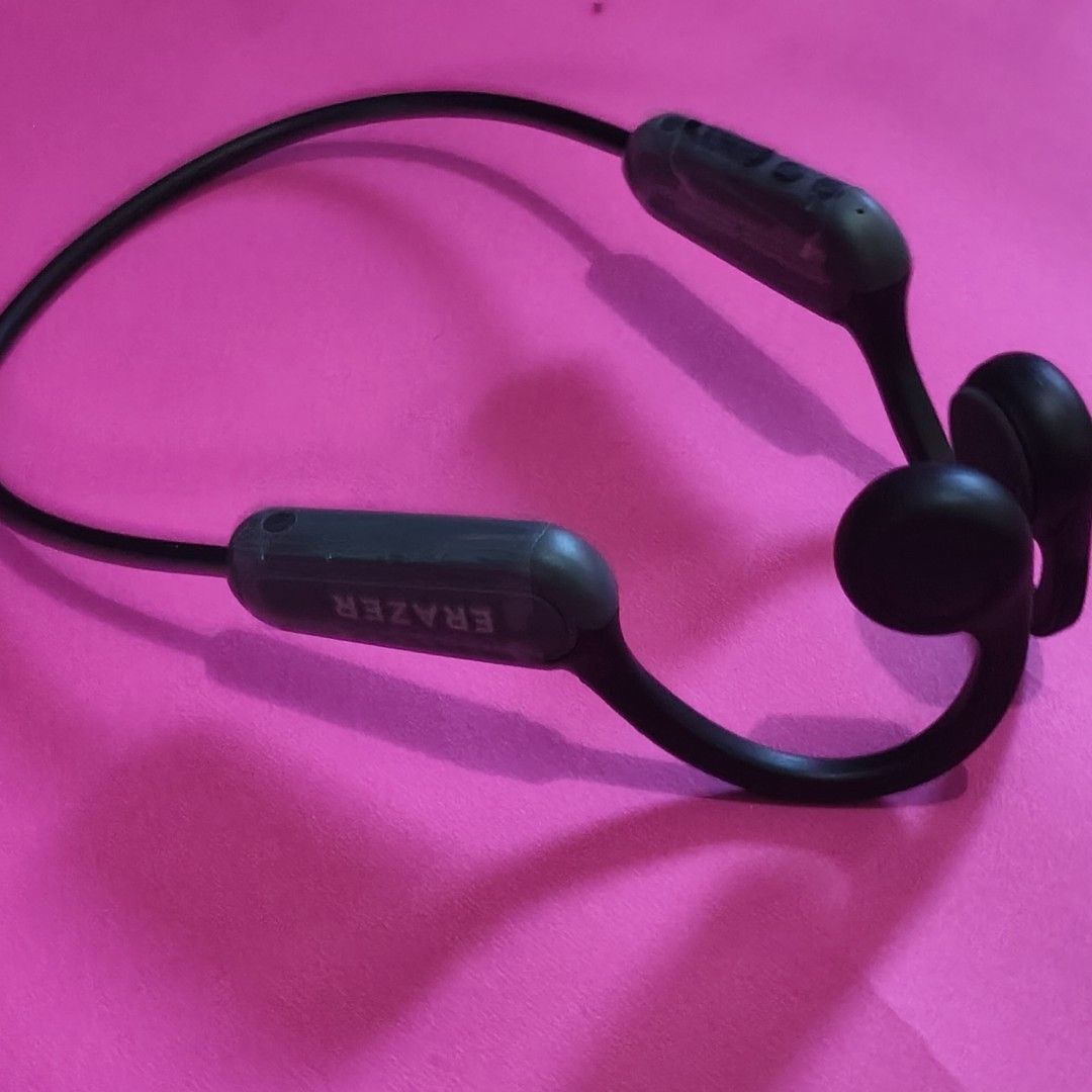LENOVO Erazer Wireless BONE CONDUCTION (Category: Earphones) located in Paranaque City. Submitted by audioaddict0517 (Listing ID 1427693165, Image 2). Description: Erazer XF22 wireless earbuds. The earbuds are black and come with a charging case and user manual. The box indicates it is invested by Lenovo. The earbuds are designed for gaming. The box also indicates it is a Wireless Earbud XF22..
