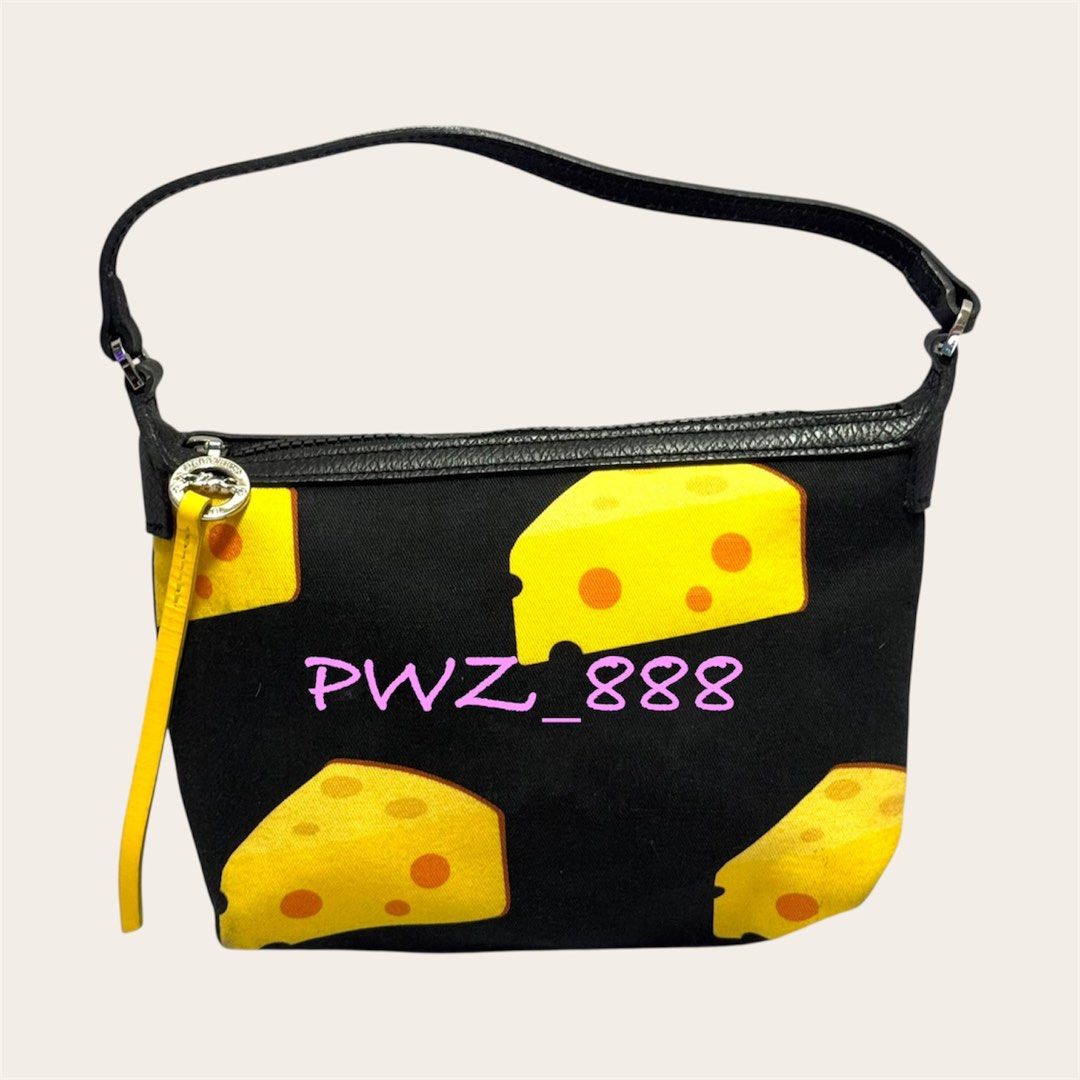 Longchamp Micro Handbag (Category: Luxury Bags & Wallets) located in Baguio. Submitted by pwz-eshop (Listing ID 1427730206, Image 1). Description: • Please make reading a habit! • I do not reserve items. I only mark items as reserved when it is paid. Paid items are shipped the next day. No shipping on holidays. • Up for Grabs!! • Flaws: Dirt marks on fabric and pen mark on lining. (please see photos) • BRAND: Long champ. • DIMENSIONS: length 9", 