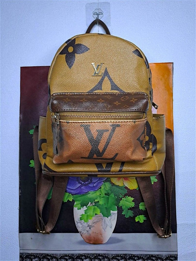 Louis Vuitton Mini Backpack (Category: Luxury Bags & Wallets) located in Quezon City. Submitted by yaseen73 (Listing ID 1427778160, Image 1). Description: •Louis Vuitton mini backpack features the iconic LV monogram pattern • It has a front pocket with a zipper and adjustable straps • The interior has a black lining with a Louis Vuitton label • The backpack has a top handle and gold-tone hardware • The zipper has the RIRI logo •The bag has some s