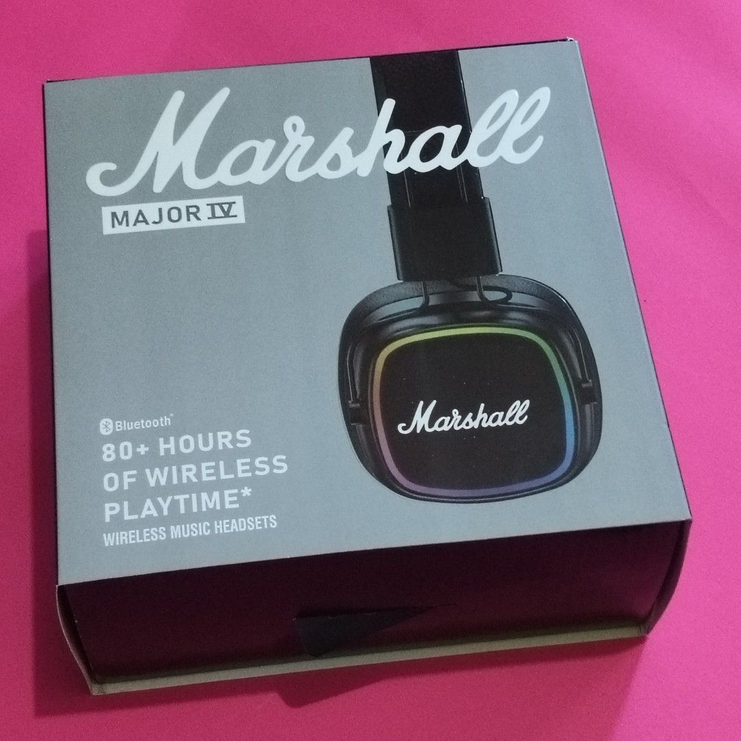 Marshall Major IV Wireless HeadphonesOEM (Category: Headphones & Headsets) located in Paranaque City. Submitted by audioaddict0517 (Listing ID 1427693034, Image 2). Description: Marshall Major IV headphones feature a black design. The box indicates 80+ hours of wireless playtime. The headphones have the Marshall logo on the earcups. The box also shows the Bluetooth feature. The headphones are over-ear style..