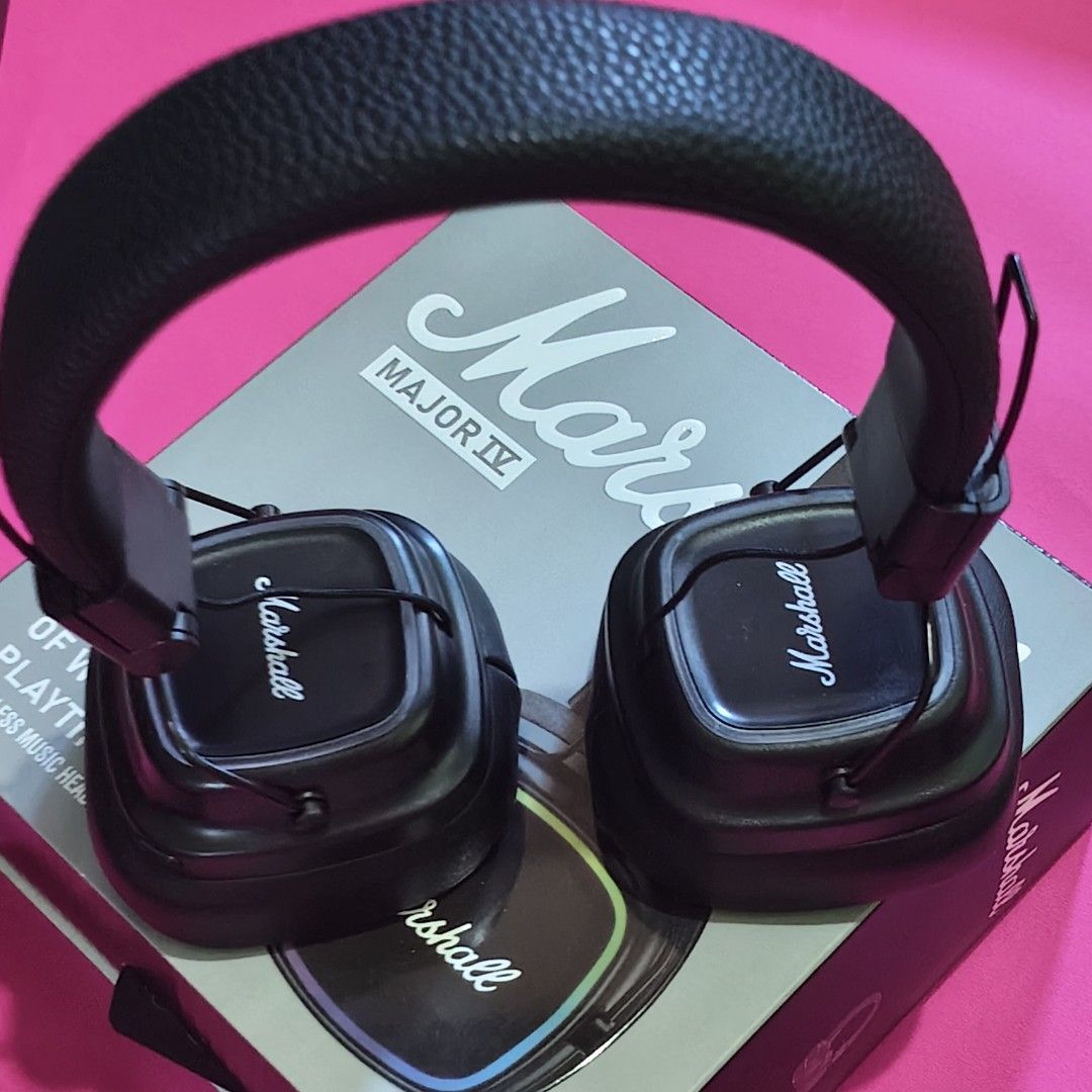 Marshall Major IV Wireless HeadphonesOEM (Category: Headphones & Headsets) located in Paranaque City. Submitted by audioaddict0517 (Listing ID 1427693034, Image 1). Description: Marshall Major IV headphones feature a black design. The box indicates 80+ hours of wireless playtime. The headphones have the Marshall logo on the earcups. The box also shows the Bluetooth feature. The headphones are over-ear style..