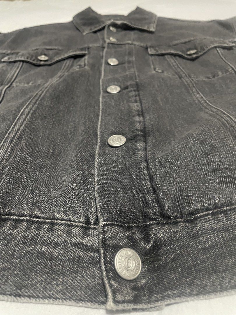 MM6 Maison Margiela Denim Vest (Category: Coats, Jackets and Outerwear) located in Iloilo. Submitted by darvoza (Listing ID 1427655446, Image 3). Description: MM6 Maison Margiela denim vest features a classic design with a button-down front, two chest pockets, and two side pockets. The vest is sleeveless and has the MM6 Maison Margiela logo on the buttons and the label. It is a size 38 and made in Italy..