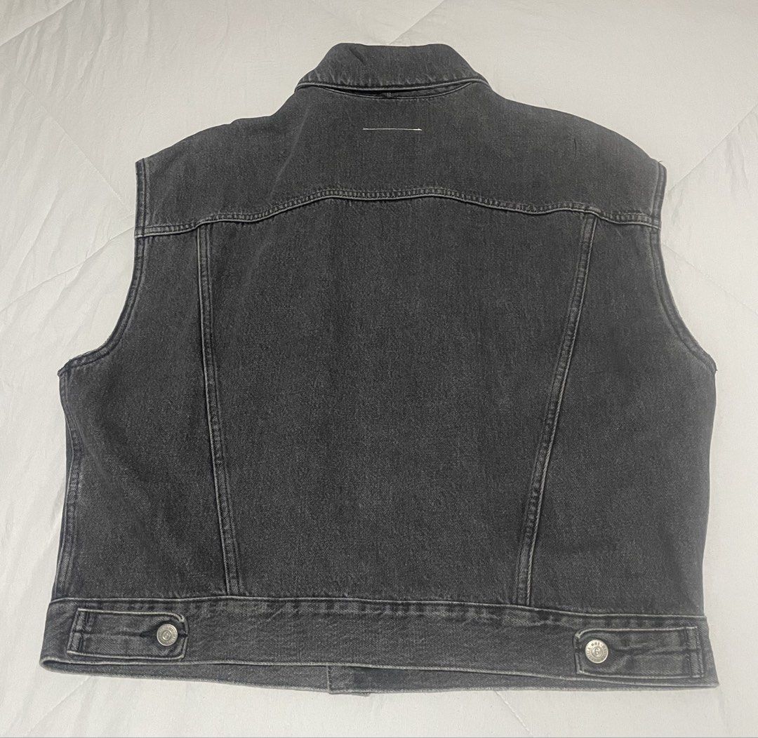 MM6 Maison Margiela Denim Vest (Category: Coats, Jackets and Outerwear) located in Iloilo. Submitted by darvoza (Listing ID 1427655446, Image 2). Description: MM6 Maison Margiela denim vest features a classic design with a button-down front, two chest pockets, and two side pockets. The vest is sleeveless and has the MM6 Maison Margiela logo on the buttons and the label. It is a size 38 and made in Italy..