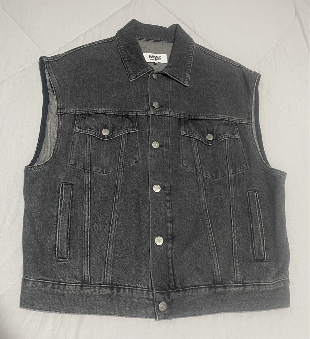 MM6 Maison Margiela Denim Vest (Category: Coats, Jackets and Outerwear) located in Iloilo. Submitted by darvoza (Listing ID 1427655446, Image 1). Description: MM6 Maison Margiela denim vest features a classic design with a button-down front, two chest pockets, and two side pockets. The vest is sleeveless and has the MM6 Maison Margiela logo on the buttons and the label. It is a size 38 and made in Italy..