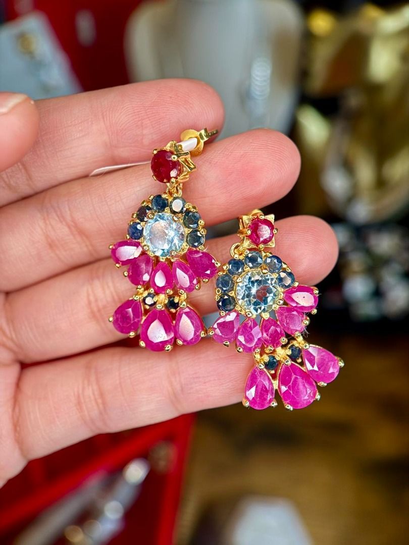 Natural Ruby, Sapphire & Topaz | Satement Earrings (Category: Earrings) located in Baguio. Submitted by asna_taku (Listing ID 1427648033, Image 1). Description: ✨ Statement Luxury You Won’t See Twice ✨ If you’re tired of “common” pieces… this is your upgrade. 💎 💖 Natural RUBY, SAPPHIRE & TOPAZ ✨ Intricate multi-gem floral design 💛 Silver plated in gold 🆕 Brand new 📦 Only 3 pairs available 1❌ 2✅ ₱9,880 💎 Why you need this: • Instantly elevat