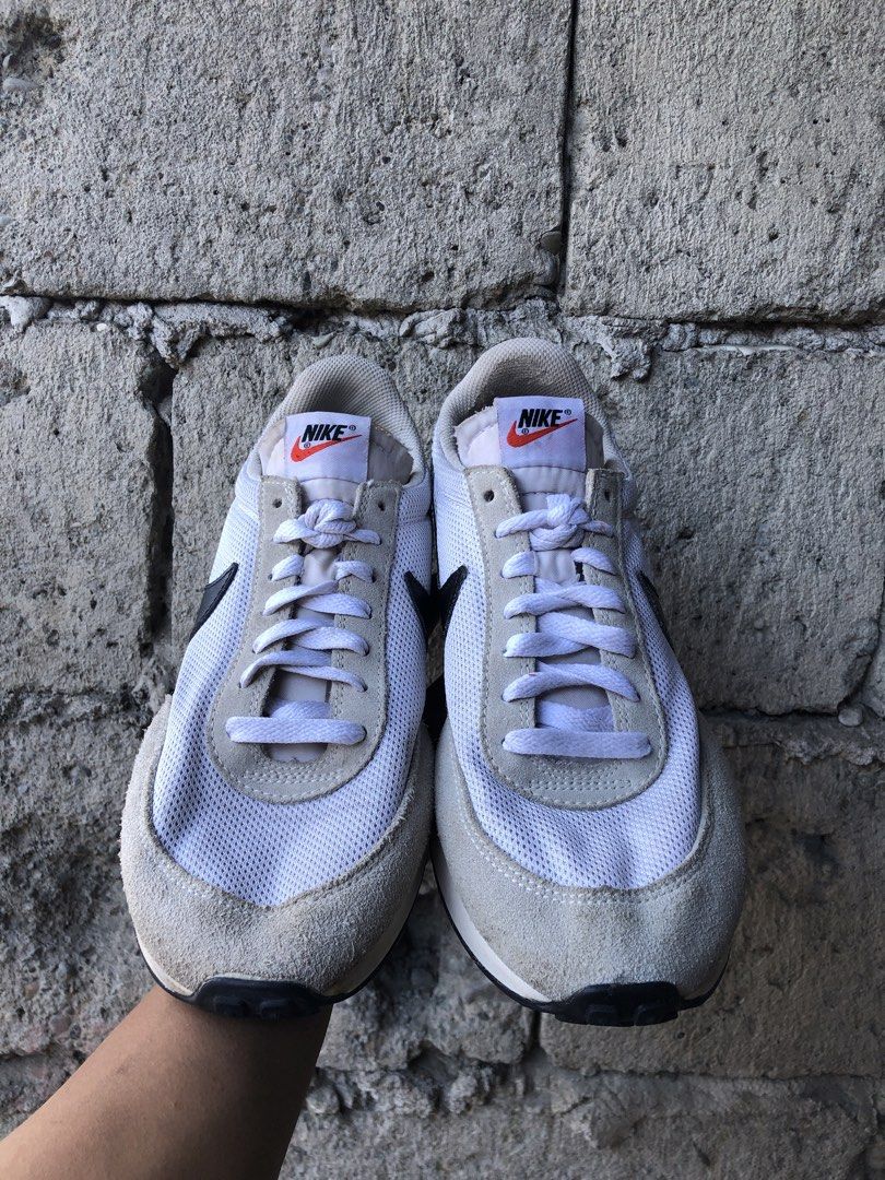 Nike Tailwind 79 - White/Black (Category: Sneakers) located in Dipolog. Submitted by sellgoodsitem_2k23 (Listing ID 1427753745, Image 2). Description: Nike Tailwind 79 sneakers in white and black. Features a white mesh upper with suede overlays. The Nike swoosh is black. The tongue has a Nike logo in orange. The heel has a black panel with the Nike logo in white. The size is EUR 41..