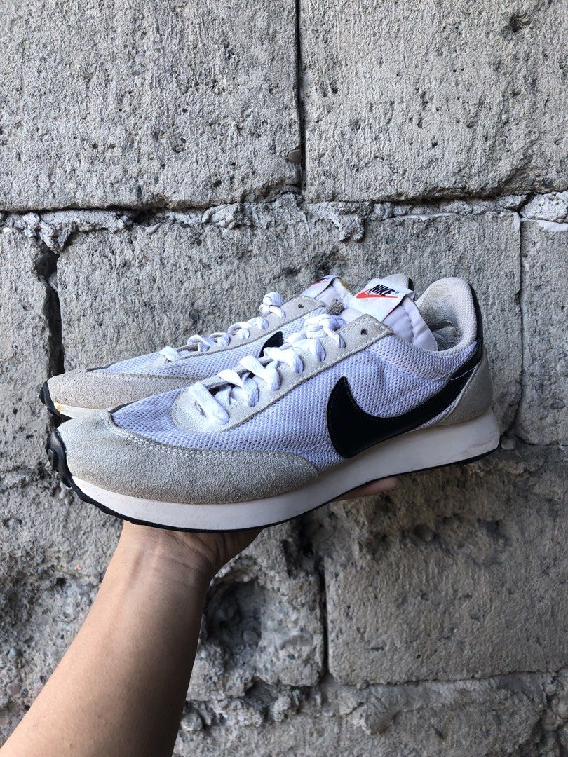 Nike Tailwind 79 - White/Black (Category: Sneakers) located in Dipolog. Submitted by sellgoodsitem_2k23 (Listing ID 1427753745, Image 3). Description: Nike Tailwind 79 sneakers in white and black. Features a white mesh upper with suede overlays. The Nike swoosh is black. The tongue has a Nike logo in orange. The heel has a black panel with the Nike logo in white. The size is EUR 41..