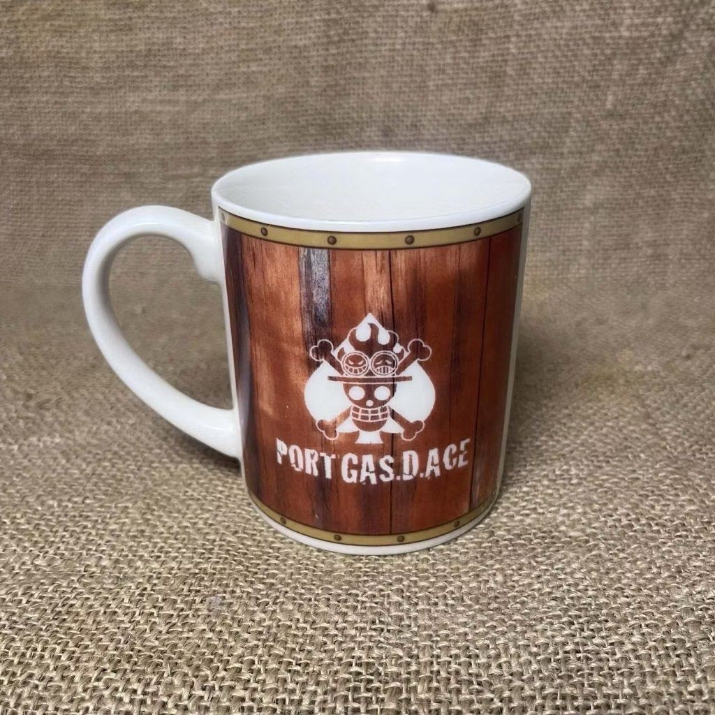 One Piece Ceramic Mug (Category: Coffee & Tea Tableware) located in Bulacan. Submitted by ceramicscubby (Listing ID 1427722894, Image 3). Description: Size:3.1 D x 3.5 H in. ❗️CLOSING DOWN SALE, ALL PRICES ARE MARKED DOWN. WE WILL NOT BE ACCEPTING OFFERS LOWER THAN OUR ASKING PRICE. ❗️ Mug features the character Portgas D. Ace from the anime series One Piece. It has a design of Ace's wanted poster on one side and the Portgas D. Ace logo on the ot
