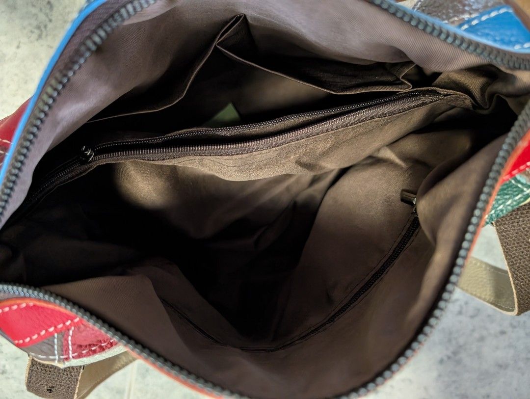 Patchwork Leather Crossbody Bag (Category: Shoulder Bags) located in Singapore. Submitted by joyous. (Listing ID 1427678317, Image 2). Description: Bought from overseas live streams. Large capacity Boston bag. Never used before as I don't like the leather smell from the bag. Selling cheap to clear fast..