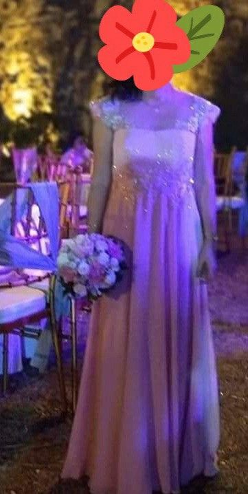 Pink Formal Gown (Category: Evening dresses & gowns) located in Manila. Submitted by teacherfarrah (Listing ID 1427668840, Image 1). Description: Elegant pink formal gown. Features a fitted bodice with delicate embellishments and cap sleeves. The dress flows into a full, floor-length skirt. Perfect for special occasions. The dress is a soft pink color..