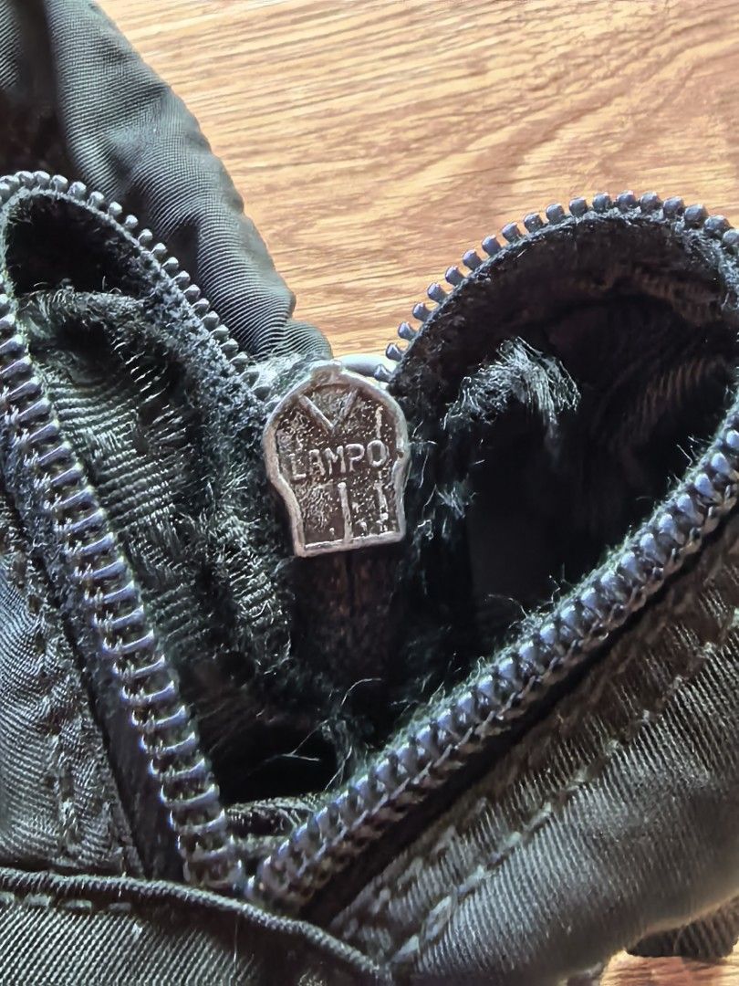 Prada Black Nylon Crossbody Bag (Category: Luxury Bags & Wallets) located in Sipalay. Submitted by muedajerry (Listing ID 1427751253, Image 2). Description: Prada nylon bag Legit Issue no inside lining Color rate 9/10 3500.