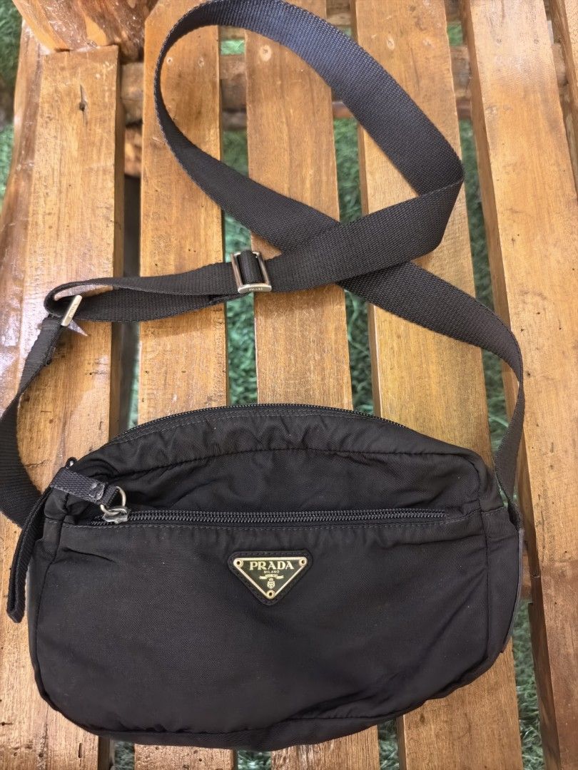 Prada Black Nylon Crossbody Bag (Category: Luxury Bags & Wallets) located in Sipalay. Submitted by muedajerry (Listing ID 1427751253, Image 1). Description: Prada nylon bag Legit Issue no inside lining Color rate 9/10 3500.
