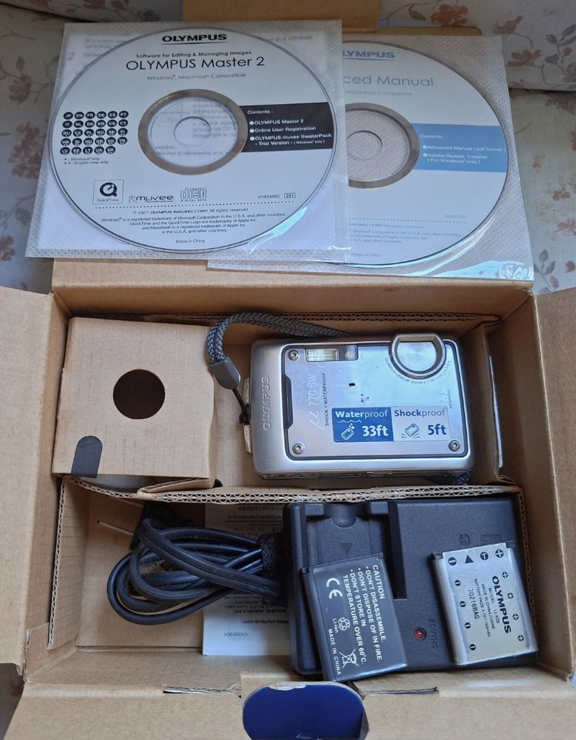 Pre Loved OLYMPUS Digital Camera (Category: Cameras) located in Caloocan City. Submitted by riceman66445 (Listing ID 1427694855, Image 3). Description: - Pre-loved Olympus µ 770 SW Digital Camera - Includes original box and manuals - Comes with charger and memory card - Shockproof and waterproof design - Features a durable metal body - Ready to capture your memories! Letting go of one of my treasured possession. This fully functional Olympus Mu d