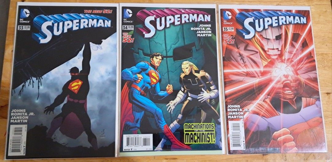 Superman Comic Book - The New 52 Issue 32 to 38 (Category: Comics & Manga) located in Quezon City. Submitted by ernestamaru2 (Listing ID 1427740780, Image 2). Description: Collection of Superman comic books from The New 52 series. Includes issues 32, 33, 34, 35, 36, 37, and 38. Features artwork by Geoff Johns, John Romita Jr., and Klaus Janson. Each comic has a $3.99 price tag. The comics showcase various Superman covers and storylines..