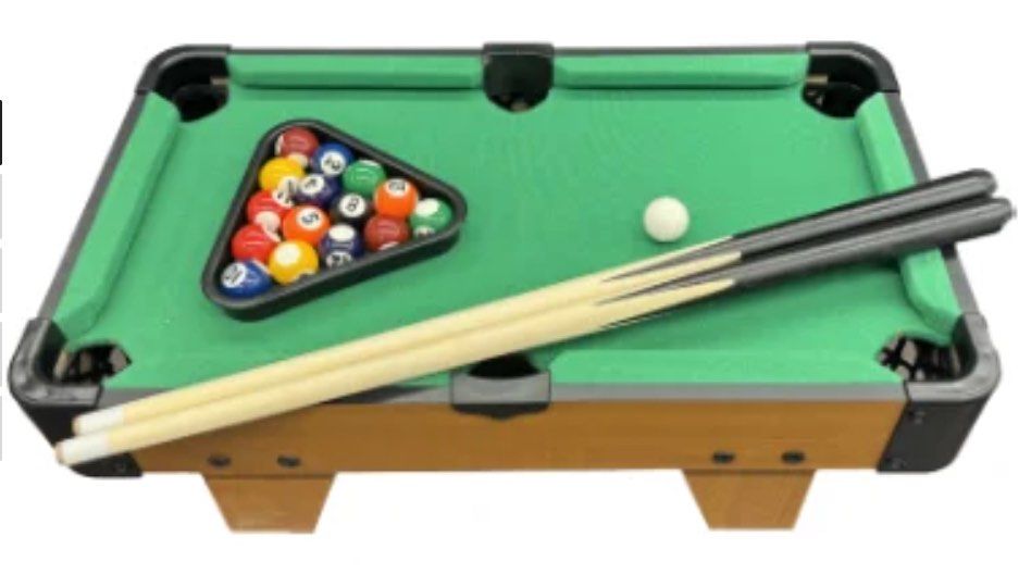 Tabletop Pool Table (Category: Board Games & Puzzles) located in Singapore. Submitted by treble99_les71 (Listing ID 1427656937, Image 3). Description: Brand new tabletop pool table, perfect for kids and adults alike! It comes with all the accessories you need to start playing, including balls, cues, and a triangle. The compact size makes it easy to store and play anywhere. Great for family fun!.