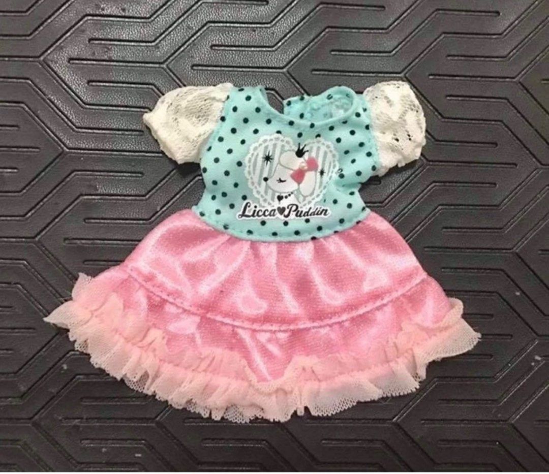 Takara licca doll clothes (sold as set ) (Category: Kids Toys) located in Manila. Submitted by yourtoothfairy (Listing ID 1316616748, Image 2). Description: SOLD as SET . 2 pcs Takara tomy clothes for licca.LIke new condition, but one has a stain on the sleeve. I think this will be removed when washed .