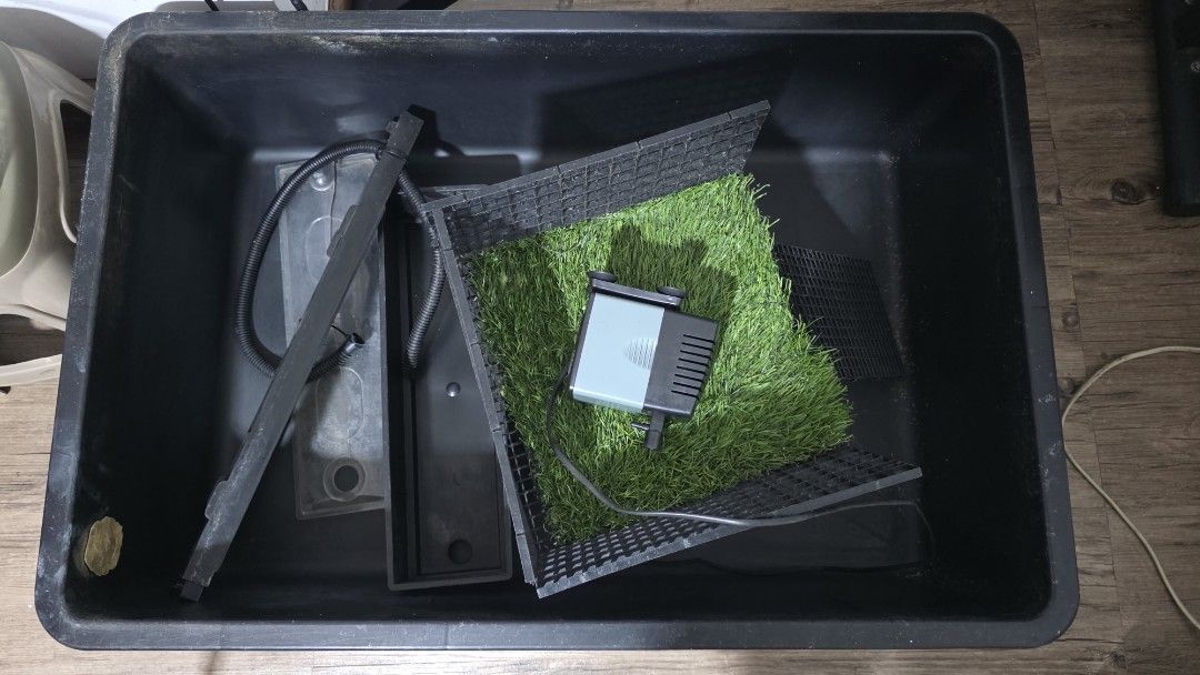 Turtle Setup Kit (Category: Homes & Other Pet Accessories) located in Singapore. Submitted by aabi98 (Listing ID 1427664420, Image 1). Description: 120 litre Turtle tub inclusive of basking platform, 1200 l/hr submersible pump and overhead filter.