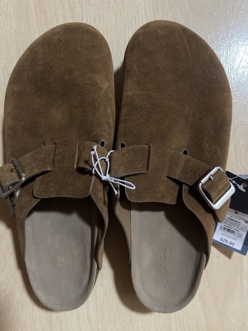 Universal Thread Clogs Sandals (Category: Flats & Sandals) located in Pasig City. Submitted by jundbaptist21 (Listing ID 1427695916, Image 1). Description: Brown clogs sandals from Universal Thread. Features a buckle closure and a textured sole. The sandals have a suede-like upper and a contoured footbed. The size is indicated as 9 1/2.The original price tag is still attached, showing a price of $29.99. Unisex From U.S.