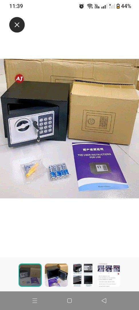 Wilson Digital Safe Box (Category: Safe) located in Manila. Submitted by micoooy (Listing ID 1427648489, Image 1). Description: Wilson digital safe features a keypad for secure access. It comes with a manual, batteries, and keys. The safe is black and has a simple design. The box is included..