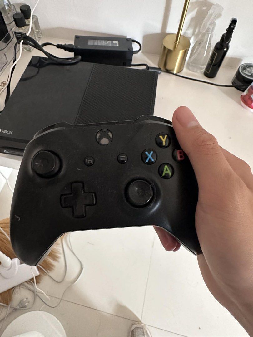 Xbox One Console with Controller (Category: Controllers) located in Agoo. Submitted by aronees (Listing ID 1427671603, Image 3). Description: Xbox One 500GB For Sale Price: ₱4,000 (negotiable) Condition: • Reset / factory default • Fully functional • With visible scratches (cosmetic only, does not affect performance) Inclusions: • 1 Controller (no battery cover) • Rechargeable batteries • Power brick • Assorted Xbox game CDs Issues: • Cosmetic sc