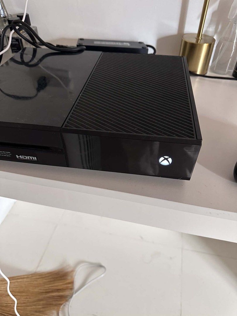Xbox One Console with Controller (Category: Controllers) located in Agoo. Submitted by aronees (Listing ID 1427671603, Image 2). Description: Xbox One 500GB For Sale Price: ₱4,000 (negotiable) Condition: • Reset / factory default • Fully functional • With visible scratches (cosmetic only, does not affect performance) Inclusions: • 1 Controller (no battery cover) • Rechargeable batteries • Power brick • Assorted Xbox game CDs Issues: • Cosmetic sc