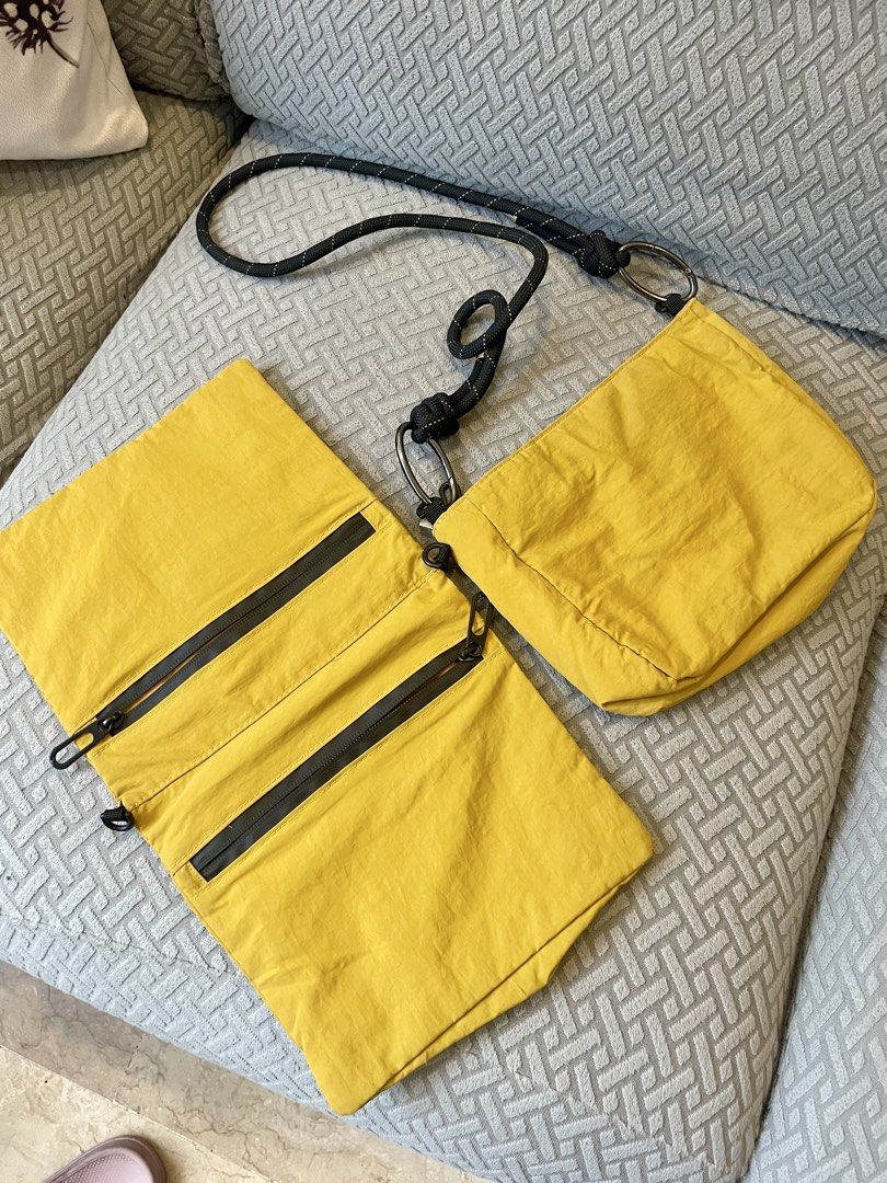 Yellow Crossbody Bag with Rope Strap (Category: Cross-body Bags) located in Quezon City. Submitted by mixeditemsforsale (Listing ID 1427764838, Image 3). Description: Crossbody bag features a vibrant yellow color and a unique rope strap. It has multiple compartments, including a zippered front pocket and an interior mesh pocket. The bag's design includes a detachable pouch..