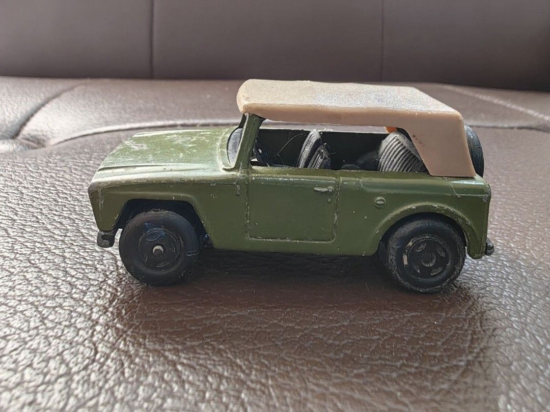 1969 Lesney Matchbox Superfast Field Car (Category: Vehicle & Diecast Models) located in Quezon City. Submitted by daned05 (Listing ID 1427849833, Image 1). Description: This vintage Matchbox Superfast Military Field Car from 1969 is a must-have for any diecast collector. The Jeep-style vehicle features a green military-themed design with a tan roof. It is made of high-quality diecast material and is part of the SUPERFAST series. Made in England 