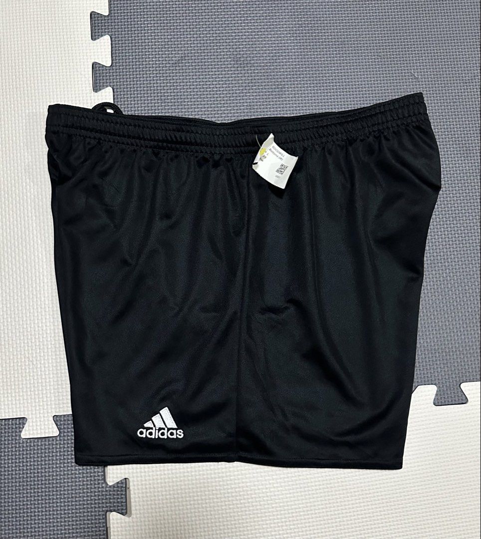 Adidas Black Shorts - Size XL (Category: Activewear) located in Malabon City. Submitted by crayoncedie (Listing ID 1427867490, Image 1). Description: Black Adidas shorts. Features the Adidas logo on the left leg. The shorts have an elastic waistband with a drawstring. The size tag indicates a size L but can fit to XL. Made of a lightweight, Mesh athletic material. Perfect for sports or casual wear..