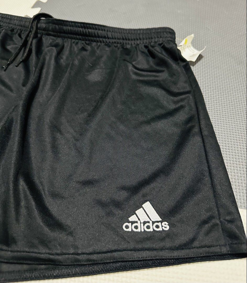 Adidas Black Shorts - Size XL (Category: Activewear) located in Malabon City. Submitted by crayoncedie (Listing ID 1427867490, Image 3). Description: Black Adidas shorts. Features the Adidas logo on the left leg. The shorts have an elastic waistband with a drawstring. The size tag indicates a size L but can fit to XL. Made of a lightweight, Mesh athletic material. Perfect for sports or casual wear..