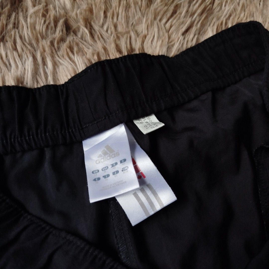 Adidas Black Shorts with White Stripes(authentic) (Category: Shorts) located in Cabiao. Submitted by aeclark (Listing ID 1427865332, Image 2). Description: .