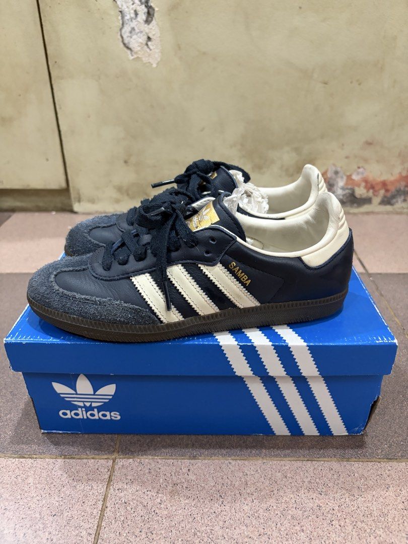 Adidas Samba OG Navy Blue (Category: Sneakers) located in Quezon City. Submitted by brandedthingsforless (Listing ID 1427789712, Image 3). Description: Adidas Samba OG in navy blue. Features the classic three stripes design. Comes with the original box. The shoes have a navy blue suede toe and leather upper. The size is indicated on the box. Perfect for everyday wear..