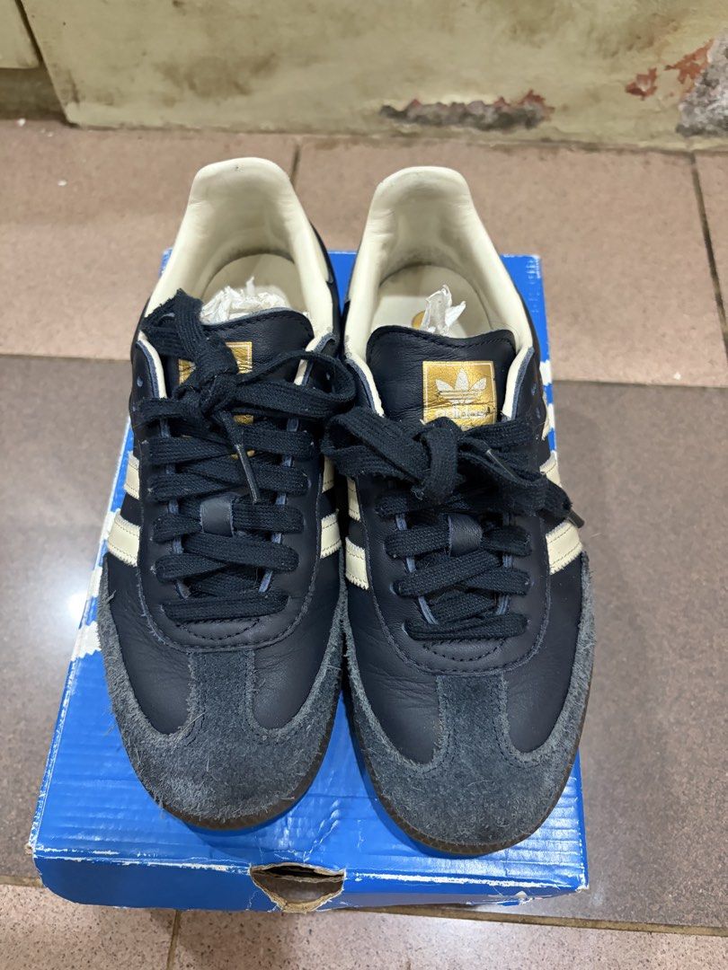Adidas Samba OG Navy Blue (Category: Sneakers) located in Quezon City. Submitted by brandedthingsforless (Listing ID 1427789712, Image 2). Description: Adidas Samba OG in navy blue. Features the classic three stripes design. Comes with the original box. The shoes have a navy blue suede toe and leather upper. The size is indicated on the box. Perfect for everyday wear..